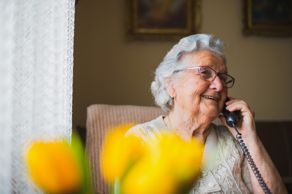 image depicting patient on the phone