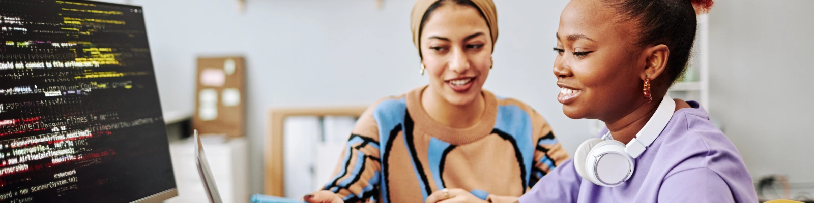 two people using a computer